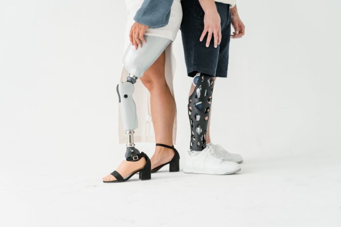 Photo by MART PRODUCTION: https://www.pexels.com/photo/people-with-prosthetic-legs-wearing-shoes-8436992/